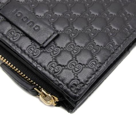 gucci bifold wallet microguccissima black.